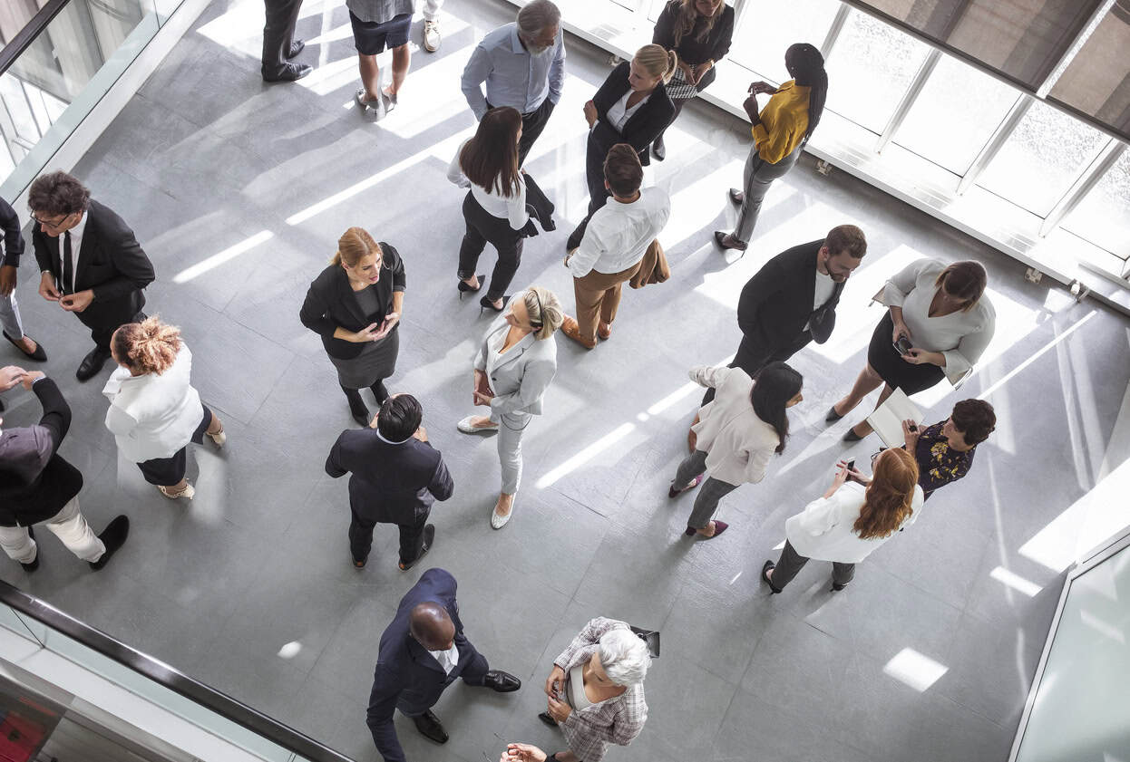 Diverse Professionals Energized Engaging at Networking Event